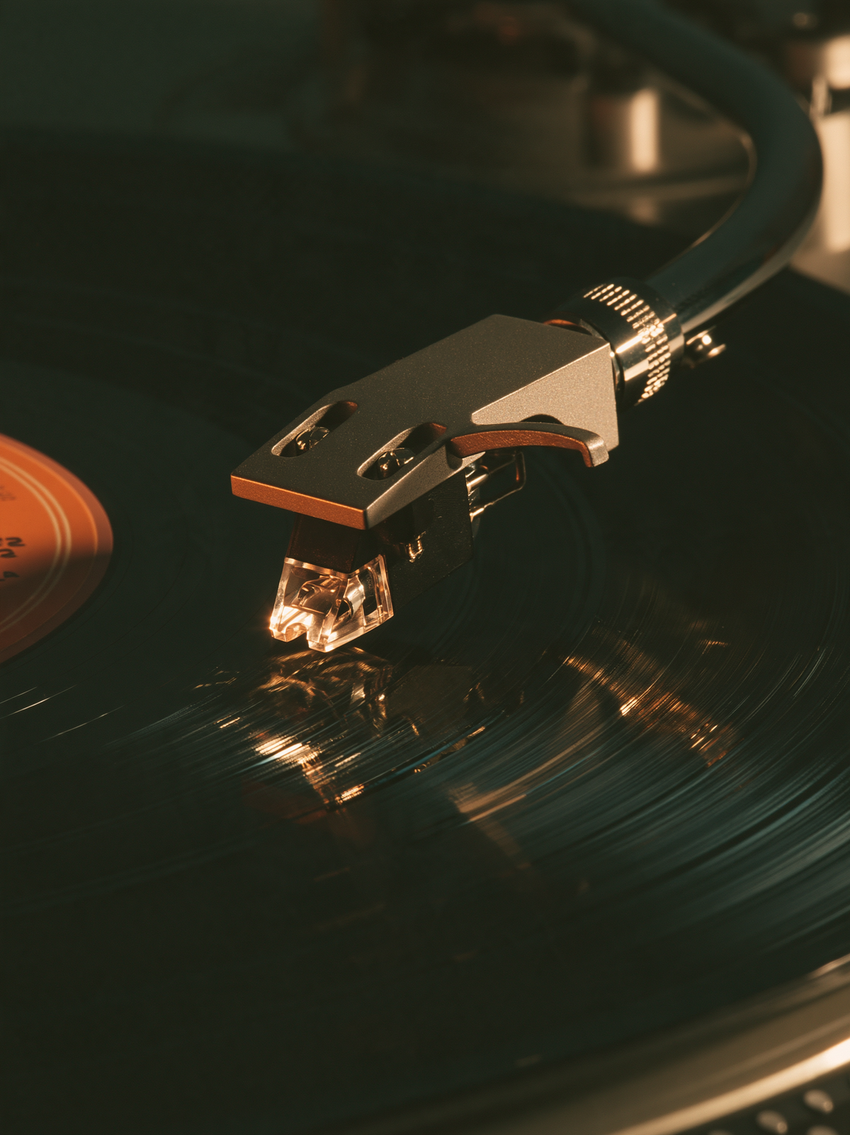 Turntable needle lowered onto the first track