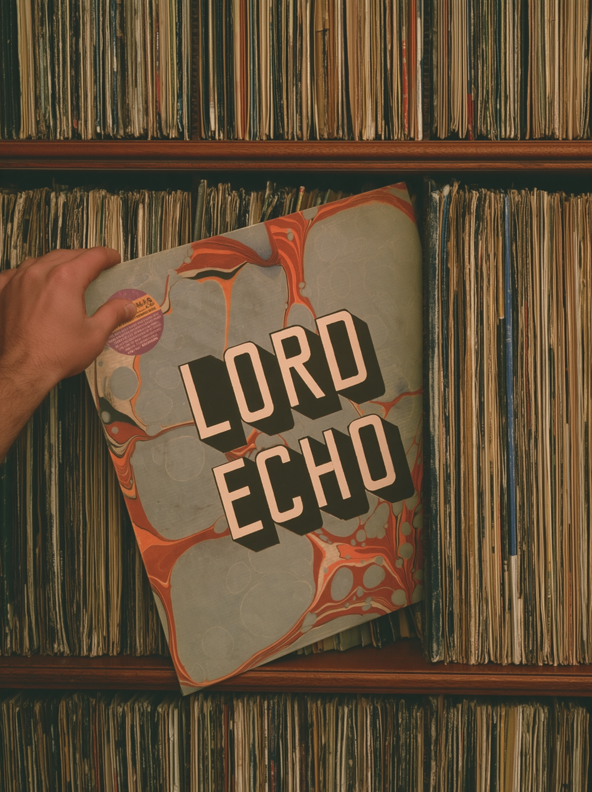 A hand pulling one record from a packed shelf